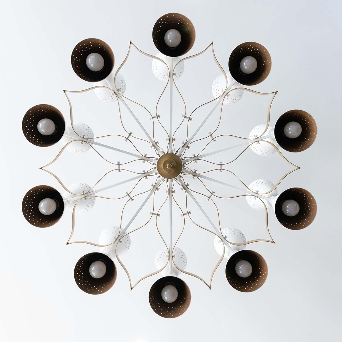 grey stone bathroom wall with circular mirror